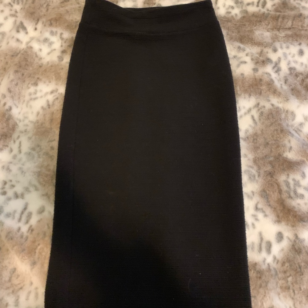 Black pencil skirt. Length is to the caves with texture.